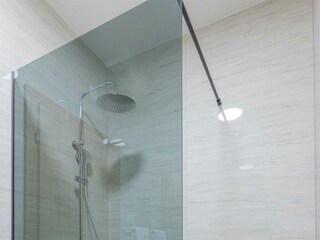 En suite bathroom with walk in shower.