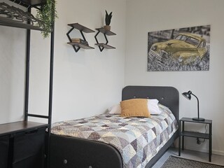 Bedroom with a single bed