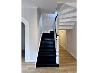 Treppenaufgang zum Obergeschoss