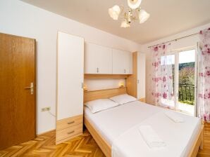 Three bedroom apartment with balcony Lopar, Rab A-24754-b