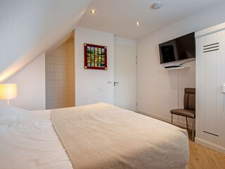 Schlafzimmer mit begehbarer Dusche