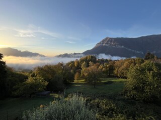 Fog above the lake, sun in Naggio