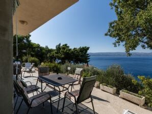 Two bedroom apartment with terrace and sea view Stanići, Omiš A-20107-c