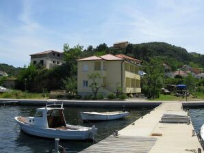 Two bedroom apartment with balcony and sea view Supetarska Draga - Donja, Rab A-11769-d