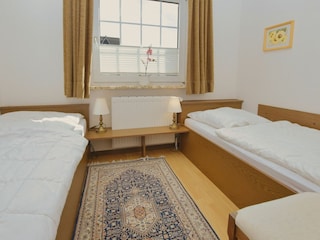 Schlafzimmer mit Einzelbetten