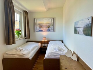 Schlafzimmer mit Einzelbetten