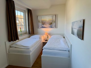 Schlafzimmer mit Einzelbetten