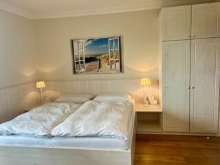 Schlafbereich mit Doppelbett