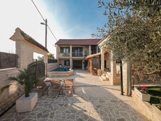 Maison de vacances Podlug Enregistrement extérieur 4