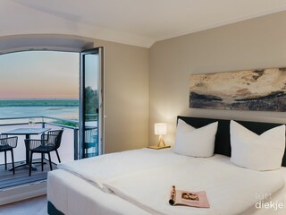 Schlafzimmer mit Balkon