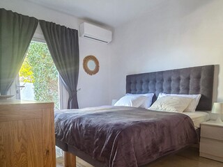 The guest bedroom opens onto the garden...