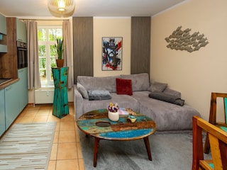 Wohnzimmer mit Küche