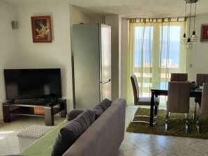 Two bedroom apartment with terrace and sea view Duće, Omiš A-24975-c