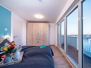 Schlafzimmer mit Wasserblick, Schleivilla Ahoi by Seeblick Ferien ORO