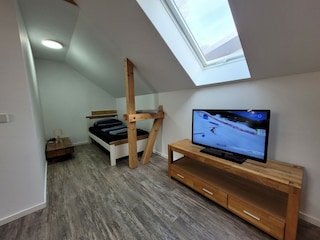 Schlafzimmer mit Zusatzbett