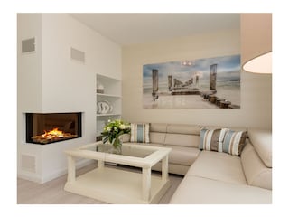 Wohnzimmer mit Kamin