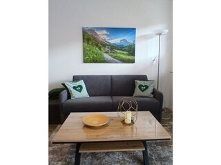 Wohnzimmer mit Schlafsofa