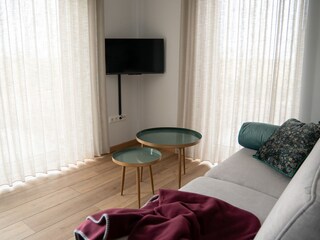 Schlafsofa mit Fernseher