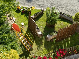 Gästekräutergarten und Rutsche