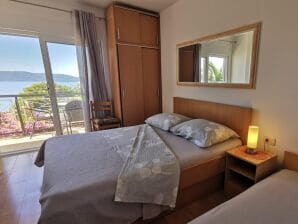 Two bedroom apartment with balcony and sea view Živogošće - Mala Duba, Makarska A-18626-b
