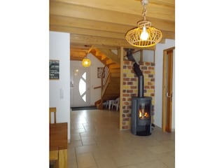 Entrance and wood-burning stove