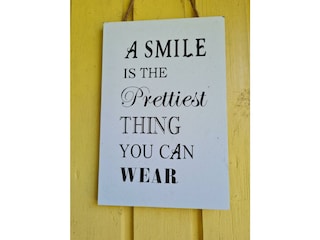 Haus im Grünen-Schild