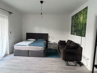 Forststrasse Apartment-Wohn/Schlafbereich