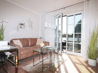 Gemütlicher Wohnbereich und Dachterrasse