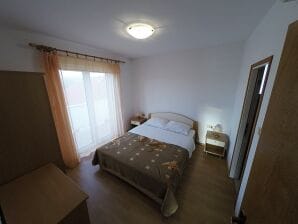 Two bedroom apartment with terrace Lopar, Rab A-20644-c