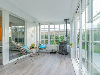 Der Wintergarten mit Kamin