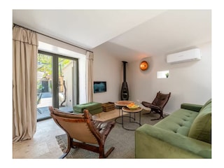 The Living Room and its Convertible Sofa