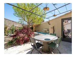 The Outdoor Table and its Pergola