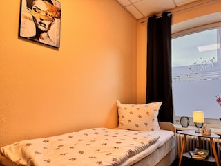 Schlafzimmer mit 2 Einzelbetten