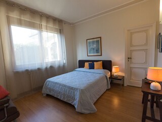 Your bedroom with a comfortable double bed.