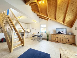 Wohnbereich mit Treppe nach oben