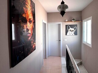 der Flur und Treppe zu den unteren Räumen