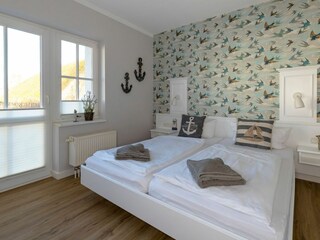 Schlafzimmer mit Doppelbett