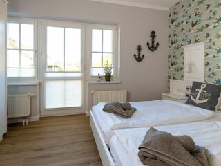 Schlafzimmer mit Doppelbett