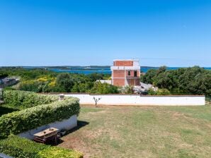 Two bedroom apartment with terrace and sea view Štinjan, Pula A-23546-b