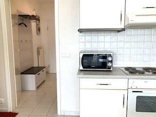 Blick in den Flur mit Garderobe.