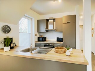 Voll ausgestattete Küche: vom Geschirrspüler bis zum Waffeleisen