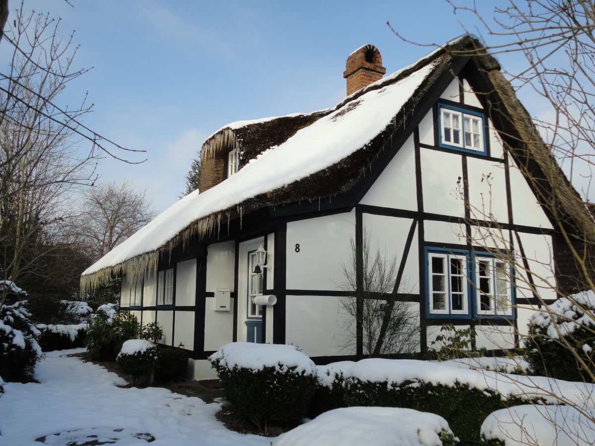 Snow-covered holiday cottage