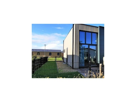 Ferienhaus Cube Elite Estel mit Dachterrasse und Zaun Haus Nr. 337