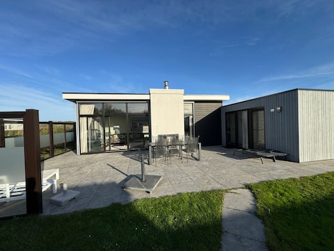 Ferienhaus Chalet Ocean Lodge mit Zaun & Windschutz am Strandaufgang G127