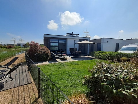 Ferienhaus Chalet Land in Sicht mit Zaun Haus Nr. 81