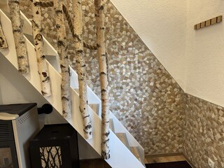 Pellet stove with staircase to the bedroom