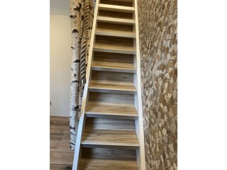 Stairs up to the bedroom