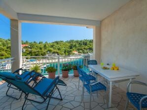 Two bedroom apartment with terrace and sea view Gršćica, Korčula A-132-a
