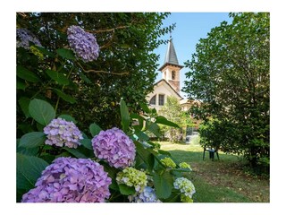 the church in front of the house