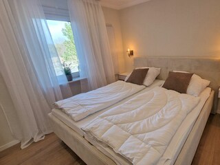 Schlafzimmer mit Doppelbett